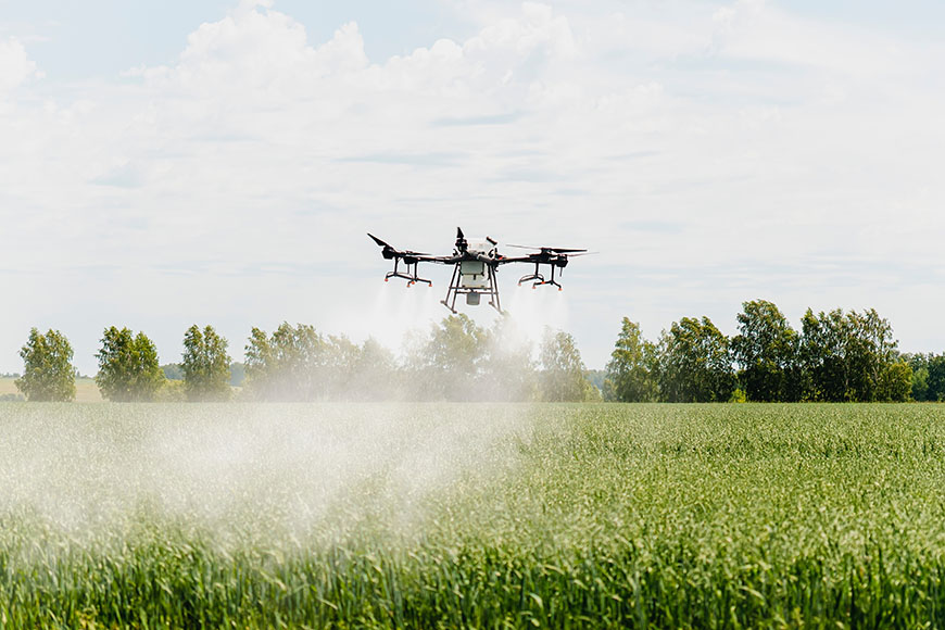 Agricultural drone performing custom application work
